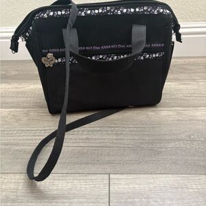Anna Sui Mini Black Crossbody Bag with Purple Inner Lining